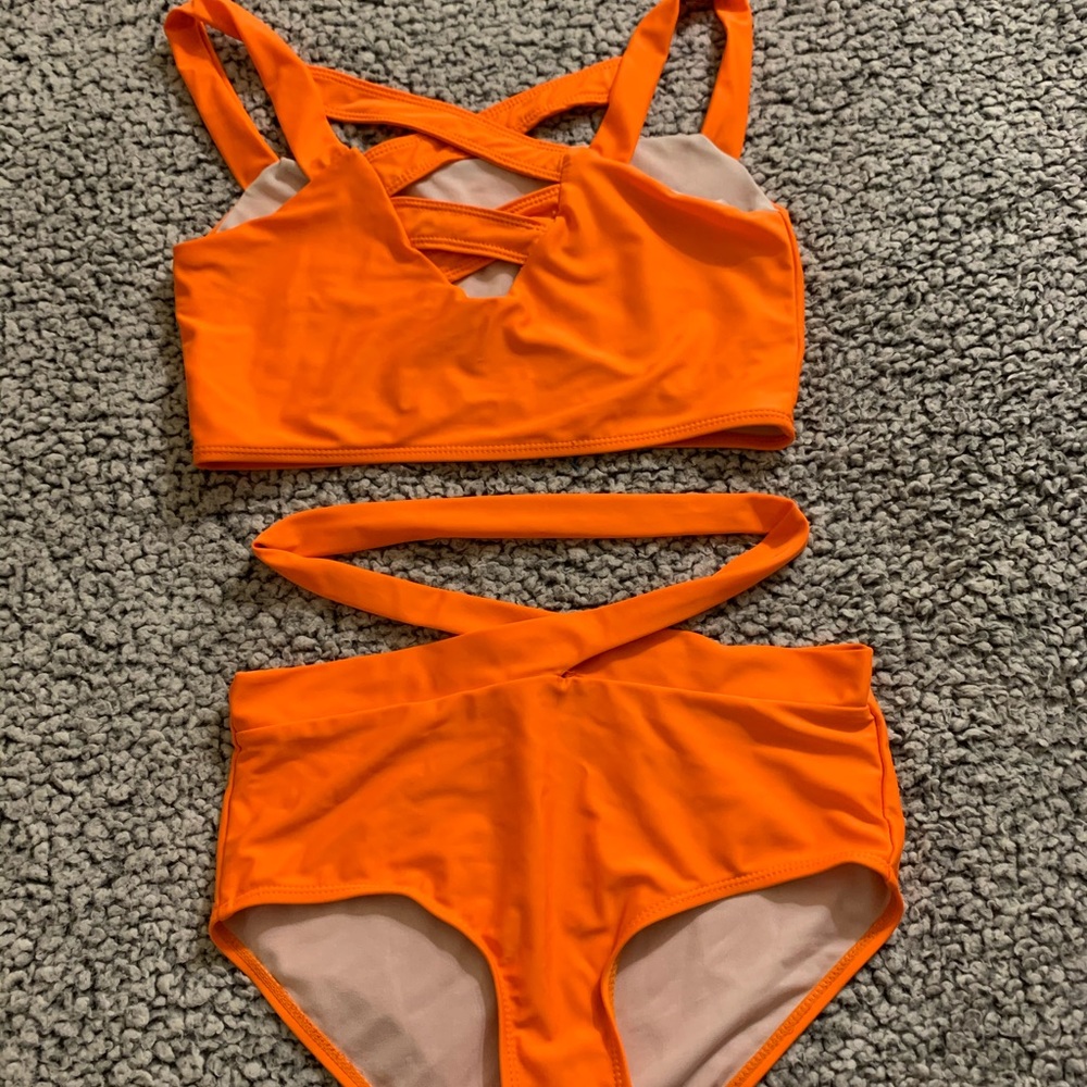Bright orange two piece swim suit